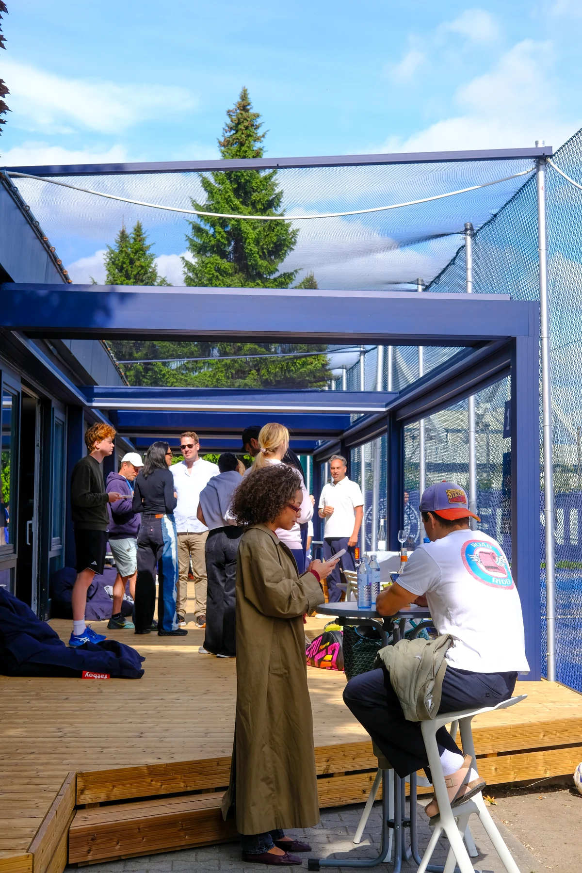 The veranda connects clubhouse and courts